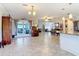 Bright open floorplan, kitchen leads out to a back patio and living spaces at 2457 Tamworth Ter, Punta Gorda, FL 33983