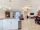 Open-concept kitchen with modern amenities and easy access to outdoor living spaces at 2457 Tamworth Ter, Punta Gorda, FL 33983