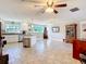 Spacious kitchen features tile flooring, white cabinets and stainless steel appliances at 2457 Tamworth Ter, Punta Gorda, FL 33983