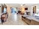 Spacious living room with tile flooring, large windows, and neutral paint, creating a comfortable atmosphere at 2457 Tamworth Ter, Punta Gorda, FL 33983