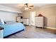 Spacious main bedroom features wood flooring and an ensuite bathroom at 2457 Tamworth Ter, Punta Gorda, FL 33983