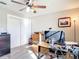 Bright home office with natural light, wood floors, and plenty of space for work at 2457 Tamworth Ter, Punta Gorda, FL 33983