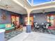 Covered patio with outdoor seating, ceiling fans, and access to interior spaces, ideal for relaxation at 2457 Tamworth Ter, Punta Gorda, FL 33983