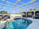 Enjoy the private screened-in pool area with a covered patio, perfect for relaxing and entertaining outdoors at 2457 Tamworth Ter, Punta Gorda, FL 33983