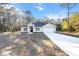 Beautiful single-story home featuring a well-lit facade, two-car garage, and neatly kept landscaping at 13357 Canada Goose Rd, Weeki Wachee, FL 34614