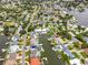 Community aerial view with lush landscaping and waterfront access from canals and bays at 1731 Clearwater Harbor Dr, Largo, FL 33770