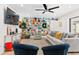 Bright living room with a collage wall, modern furnishings, and lots of natural light at 1731 Clearwater Harbor Dr, Largo, FL 33770