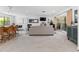 Open-concept living room featuring tile flooring, recessed lighting and large window letting in lots of natural light at 1731 Clearwater Harbor Dr, Largo, FL 33770