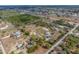 Aerial view showcases the acreage of the property and outlines the property's borders at 8279 Sunshine Grove Rd, Brooksville, FL 34613