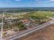 Aerial view showcases the acreage of the property and outlines the property's borders at 8279 Sunshine Grove Rd, Brooksville, FL 34613