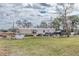 Exterior shot of a single story home with grass in front at 8279 Sunshine Grove Rd, Brooksville, FL 34613