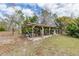 Exterior shot of outdoor structure with built in counters and barbeque at 8279 Sunshine Grove Rd, Brooksville, FL 34613