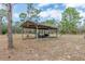 Exterior shot of another outdoor structure at 8279 Sunshine Grove Rd, Brooksville, FL 34613