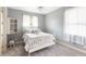 Comfortable bedroom with a cozy atmosphere, natural light and soft carpet flooring at 8305 Welsford Rd, Port Charlotte, FL 33981