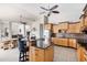 Well-lit kitchen with granite countertops, stainless steel appliances, and ample cabinet space at 8305 Welsford Rd, Port Charlotte, FL 33981