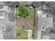 Birds-eye-view of property, highlighting the roof, large backyard and a shed at 5078 Kenmore St, Spring Hill, FL 34608