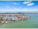 Waterfront home with private dock on a serene canal, city skyline in the distance at 849 Harbor Is, Clearwater Beach, FL 33767