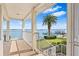 Waterfront balcony with white railings and scenic views of the bay at 849 Harbor Is, Clearwater Beach, FL 33767