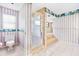 Bathroom with a walk-in shower, bathtub, and tiled flooring at 849 Harbor Is, Clearwater Beach, FL 33767