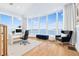 Office area with floor-to-ceiling windows offering an expansive ocean view and a desk area at 849 Harbor Is, Clearwater Beach, FL 33767