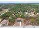 Peaceful community setting with homes surrounded by dense green forest at 14183 English Sparrow Rd, Weeki Wachee, FL 34614