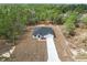 Well-maintained single-story home with a long driveway in a serene setting at 14183 English Sparrow Rd, Weeki Wachee, FL 34614