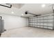 Spacious garage with an automatic door and room for storage at 14183 English Sparrow Rd, Weeki Wachee, FL 34614