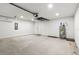 The garage has plenty of space for storage and an automatic door at 14183 English Sparrow Rd, Weeki Wachee, FL 34614