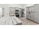 Spacious kitchen featuring gray cabinets, stainless steel appliances, and marble countertops at 14183 English Sparrow Rd, Weeki Wachee, FL 34614