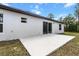 There is a concrete patio in the backyard of this home at 14183 English Sparrow Rd, Weeki Wachee, FL 34614