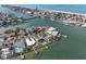 Waterfront home with private dock in a scenic coastal neighborhood, providing direct access to the bay at 193 Mar St, St Pete Beach, FL 33706