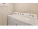 Efficient laundry room with modern washer and dryer at 11224 Topaz St, Spring Hill, FL 34606