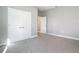 Neutral bedroom with carpet, a ceiling light fixture, and a closet with double doors at 2576 Pecan St, North Port, FL 34287