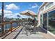 Scenic deck with seating, ideal for outdoor dining and relaxation with a picturesque waterfront view at 4446 Bahama Dr, Hernando Beach, FL 34607