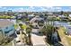 Waterfront property featuring a circular design, ample parking, and a well-manicured lawn at 4446 Bahama Dr, Hernando Beach, FL 34607