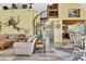 Open-concept living area with spiral staircase and view of kitchen at 4446 Bahama Dr, Hernando Beach, FL 34607
