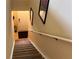 Stairway leading to the front door, with stylish decor and a welcoming ambiance at 5520 Rosehill Rd # 201, Sarasota, FL 34233