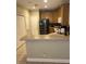 Functional kitchen with stainless steel refrigerator and light cabinets at 4939 Marina Palms Dr, Port Richey, FL 34668