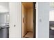 Private residential elevator featuring natural wood paneling, safety features, and compact design at 6771 Seaview Blvd, Hudson, FL 34667