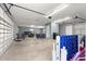 Spacious garage with ample storage, multiple vehicles, and a bright interior at 6771 Seaview Blvd, Hudson, FL 34667