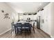 Spacious kitchen with ample cabinet space, modern appliances, a dining table, and stylish decor at 6771 Seaview Blvd, Hudson, FL 34667