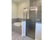 Bathroom with a walk-in glass shower, garden tub, and stylish tile work at 1608 Alliance Ave, North Port, FL 34286