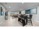 Spacious living area with plenty of natural light, modern decor, and comfortable seating at 17663 Turning Leaf Cir, Land O Lakes, FL 34638