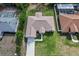 Aerial view of the property highlighting the surrounding neighborhood and serene, tree-lined streets at 4196 Hoffman Ave, Spring Hill, FL 34606