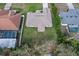 Real estate aerial view of home showing large backyard, fence, and proximity to neighboring properties at 4196 Hoffman Ave, Spring Hill, FL 34606
