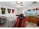 Bedroom featuring TV and gaming chair, creating a modern and entertaining space at 4196 Hoffman Ave, Spring Hill, FL 34606