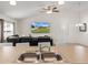 Open kitchen and island bar connecting to the home's living room at 4196 Hoffman Ave, Spring Hill, FL 34606