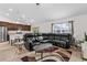 Inviting living room with a comfortable sectional sofa and stylish decor at 4196 Hoffman Ave, Spring Hill, FL 34606
