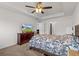 Main bedroom has ceiling fan, TV, tray ceilings and a closet off to the right at 4196 Hoffman Ave, Spring Hill, FL 34606