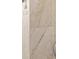 Close-up view of a shower with decorative tile and modern fixtures at 4196 Hoffman Ave, Spring Hill, FL 34606